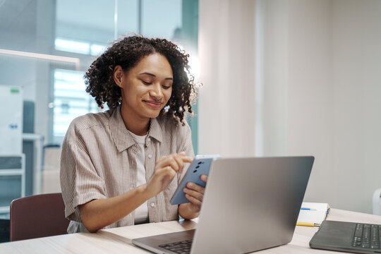 Enthusiastic Woman Utilizes Digital Tools To Organize And Track Social Media Marketing Efforts In Realtime
