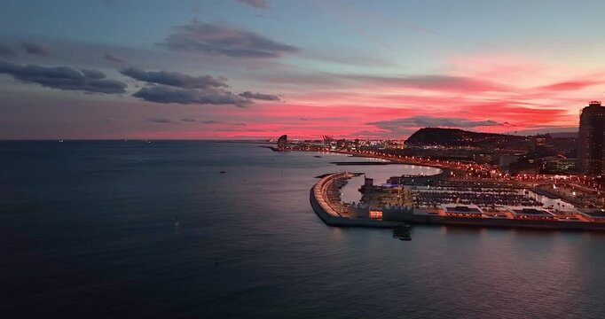Barcelona night panorama video with illuminated beach and skyline