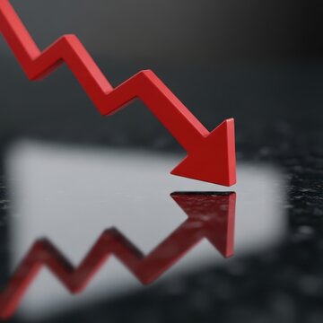 Recession Job Loss Statistics Concept. Red downward arrow reflecting on a dark surface, symbolizing decline or decrease.