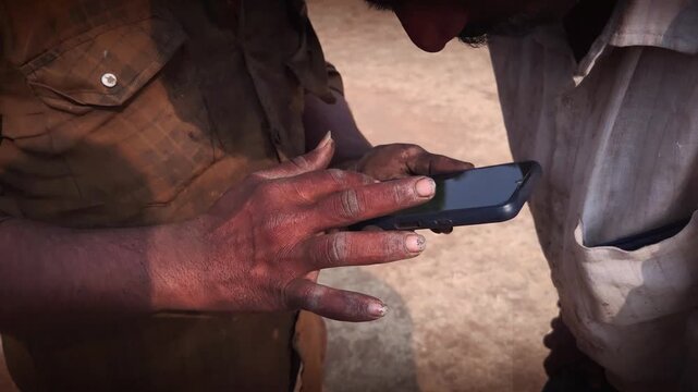 A gas delivery worker in India uses a mobile app to verify a cylinder refill. Using tools like the HP Vitaran app, they confirm the delivery on-site via OTP or digital payment, ensuring a secure, real