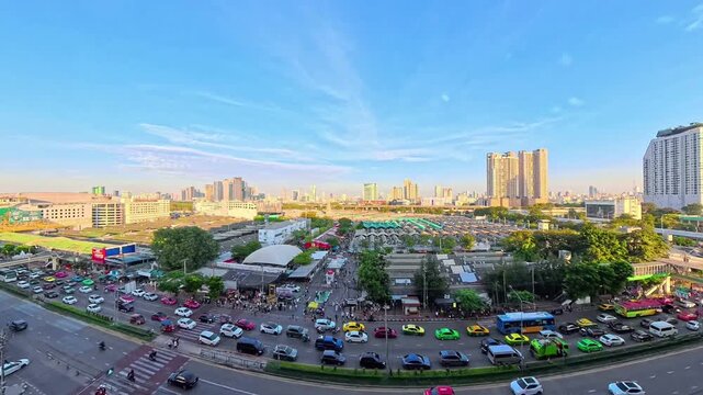 BANGKOK, THAILAND - NOV 2025 : Aerial high angle view of Chatuchak Weekend Market. Largest market in Thailand. Travel and tourism concept video. Time lapse shot, sunset to night.
