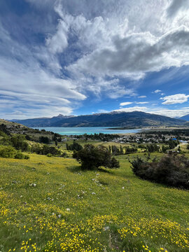Vertical Elevated landscape view of Bah&iacute;a Murta on the shores of Lago General Carrera in southern Chile. The turquoise waters of the lake stretch across the scene, framed by high Patagonian mountains.