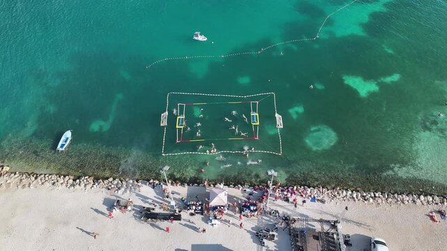 Competitive water polo match played in Adriatic Sea near Omis, Croatia.