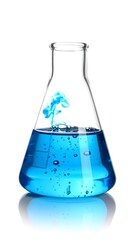 Erlenmeyer flask filled with a vibrant blue liquid with a plume of dye dissolving near the top