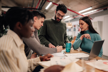 Diverse business team collaborating during office meeting