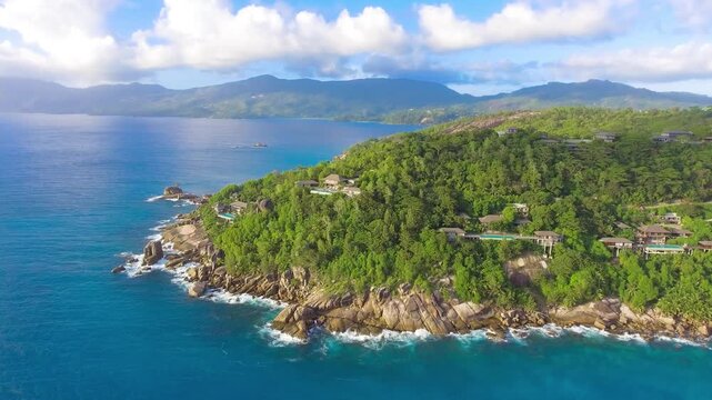 Drone viewpoint of beautiful Seychelles coastline on a sunny day