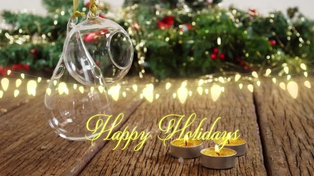 Animation of text, happy holidays, in yellow, over string lights and christmas decorations