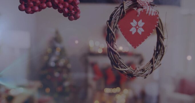 Animation of dangling christmas bauble and decorations with baubles