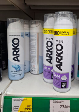 VORONEZH, Russia - February 15, 2026. Arko Men Shaving Foam and Gel (Sensitive with Aloe Vera) in white and blue spray cans on a supermarket shelf in Russia.