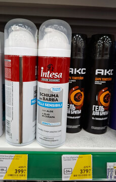 VORONEZH, Russia - February 15, 2026. Intesa Pour Homme shaving foam for sensitive skin and Axe Dark Temptation shaving gel on a retail shelf in Russia.
