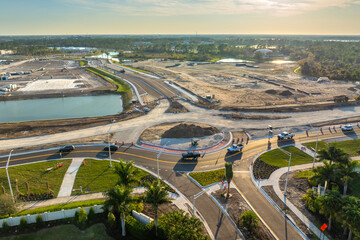 Industrial roadworks. Roundabout on wide American highway under construction. Development of transportation system for rapid transit