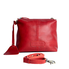 A beautiful red leather sling bag isolated on a white background, perfect for women's style. Suitable for designing leather product catalogs.