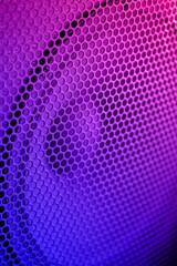 Sound Speaker grill texture. Macro. Neon color tone