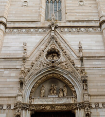 Fototapeta premium Ornate Gothic Portal Detail of the Naples Cathedral in Italy