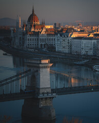 Hungarian Parliament and Chain Bridge at Autumn Sunrise in Budapest