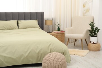Fototapeta premium Comfortable bed with stylish linens at home