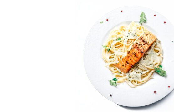Grilled Salmon with Pasta Spaghetti on Elegant White Plate