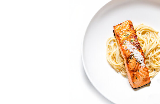 Grilled Salmon with Pasta Spaghetti on Elegant White Plate