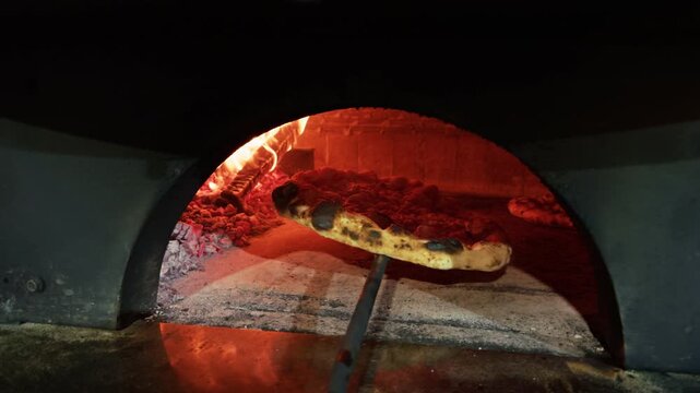 Pizza Baking in Wood Fired Oven