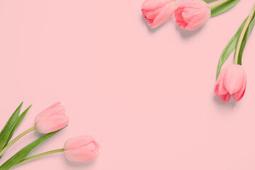Fototapeta premium Beautiful tulips on pink background, top view. Space for text