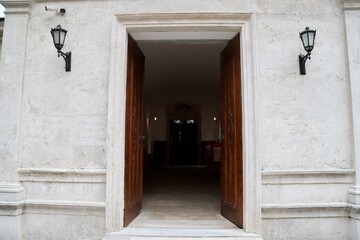 Open Wooden Doors of Historic Building Entrance, Architectural Facade Detail