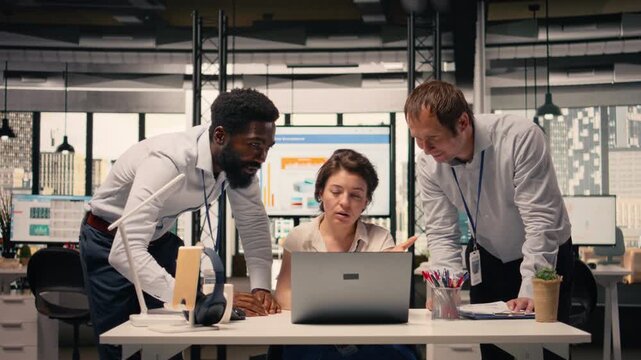 Business collaboration scene, diverse professionals, working together on laptop, data analysis, KPI metrics, modern corporate workspace. Risk assessment, corporate lifestyle, goals.