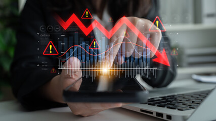 Economic caution visualized with fluctuating market graph, alert symbols, and negative data trends....
