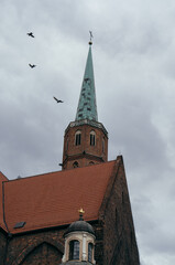 Obraz premium church steeple and clouds