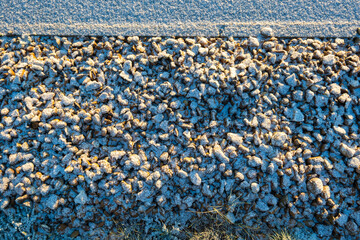 Obraz premium Frost snow covered british road and cars in england uk.