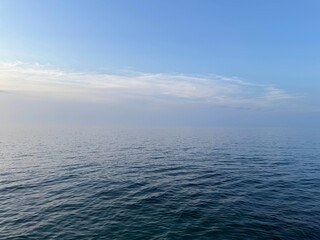 Open sea and blue clear sky.