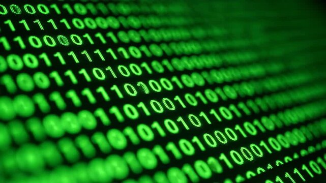 Close-up view of flowing green binary code on a dark digital screen, representing computer programming and technology concepts.