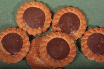 chocolate cookies on a green backgound