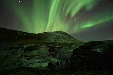 Aurora Borealis and Meteor Above Þórufoss – Rare Winter Capture © Koen