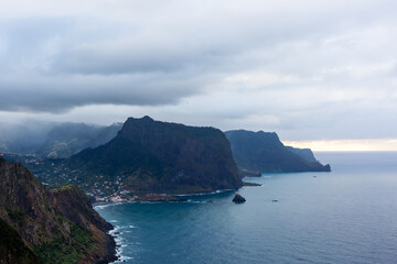 Hiking trail along Vereda do Larano, Madeira. Scenic coastal cliffs and ocean views. North East trail with dramatic landscape.