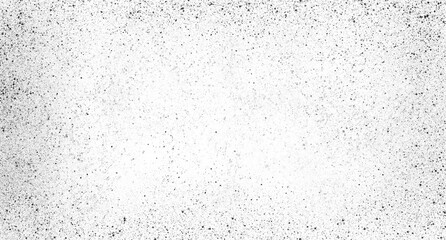 Fototapeta premium Subtle black spray paint splatter and grit texture for design overlay.