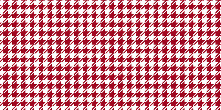 Bold red and white houndstooth seamless pattern. Iconic geometric textile background for statement fashion, holiday decor, and classic branding. High-resolution abstract texture.