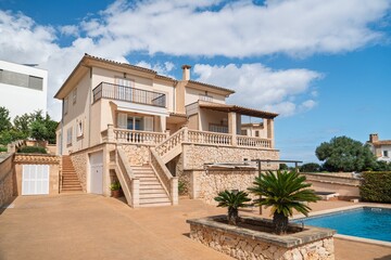 Explore this beautiful villa in Mallorica. With a private pool, stone accents, and ample living space, it is the perfect retreat for a luxurious vacation or a picturesque getaway.