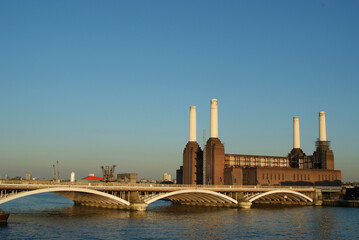 Battersea power station and grosvenor bridge over river thames