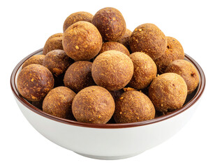 Bowl overflowing with golden-brown textured energy balls, a healthy snack option
