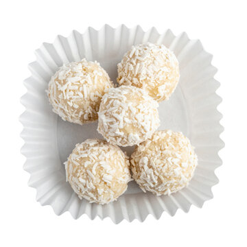 Five Coconut Covered Brigadeiro Candies in a White Paper Cup