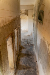 Obraz premium An abandoned monastery.A monastery from the time of French colonization in Vietnam, near Cam Ranh. Ancient French architecture. 