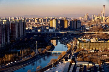 Fototapeta premium Tonghui He Canal in Chaoyang District in Beijing in Golden Morning Light
