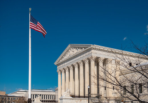 Supreme court architecture in classical civic style. Supreme court building under daylight sky. Supreme court landmark in america. Supreme court symbol of federal system.
