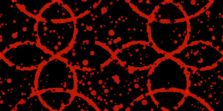 Abstract red patterns resembling cracked earth on a black background