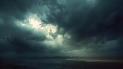 Obraz premium Stormy clouds gather over dark landscape