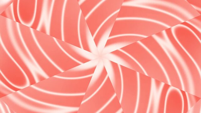 A vibrant spiral pattern of pink and white swirling shapes viewed from directly above
