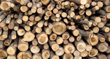 Close up stack of firewood, firewood piles are used as fuel for cooking, keeping warm, or camping
