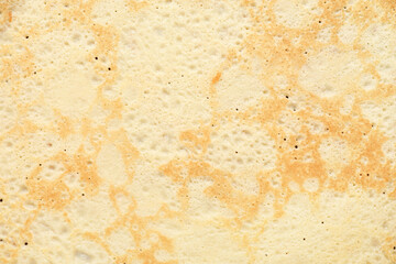 Tasty thin pancake as background, closeup