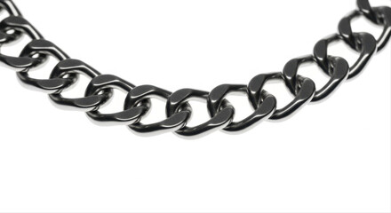 Obraz premium Black metal chain draped in a curve, isolated on a white background, resembling a pant accessory or jewelry piece
