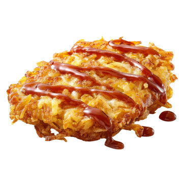 A delicious fried food with ketchup drizzled on top